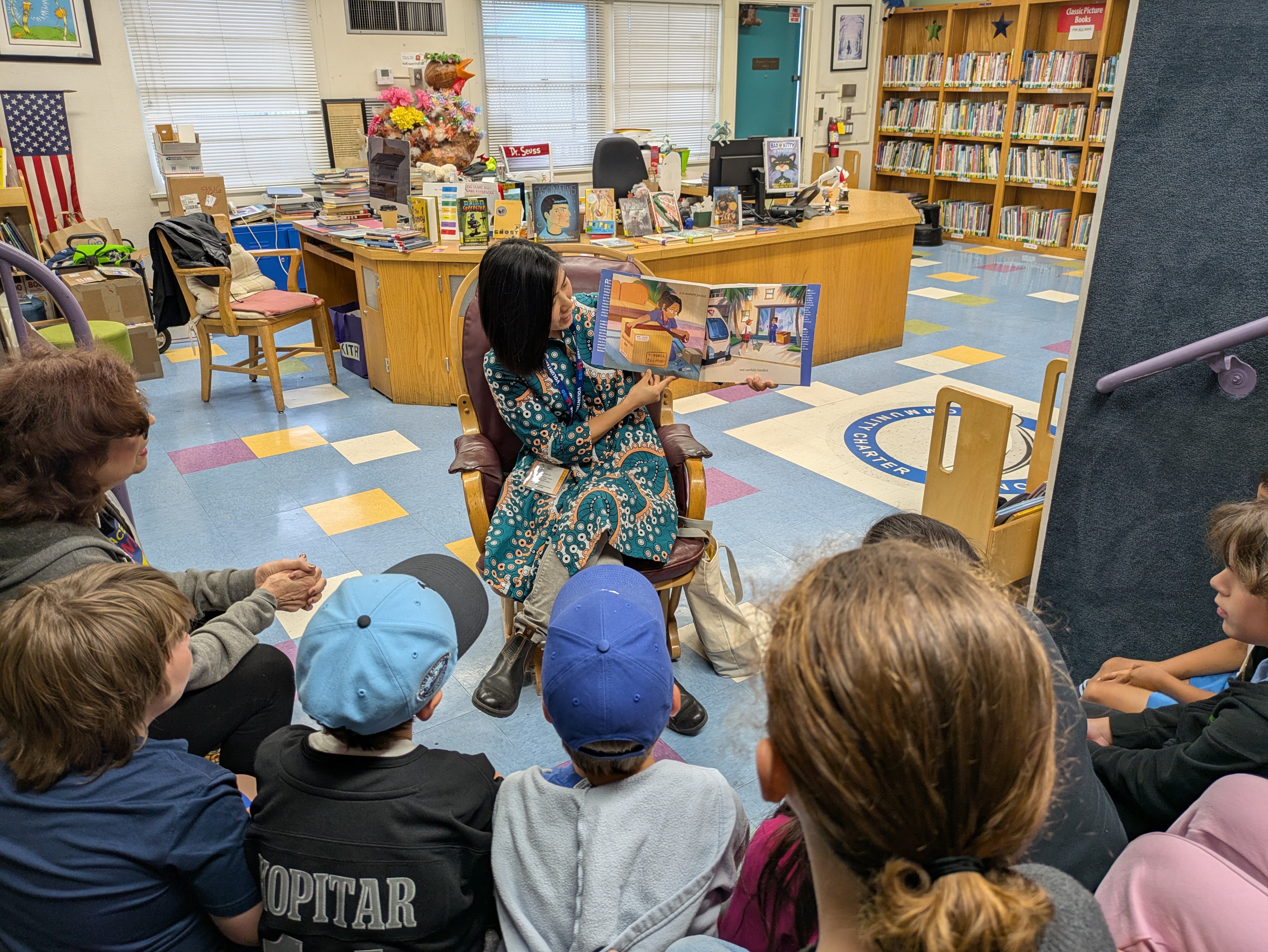 Carren Jao reading to children